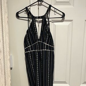 Floral pant romper with keyhole detail in front and open back